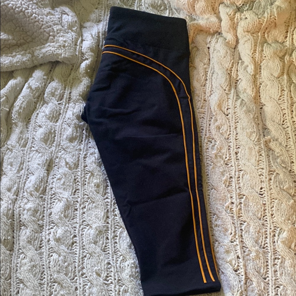 Fabletics Black and Orange workout pants capri with Signature Design XS women